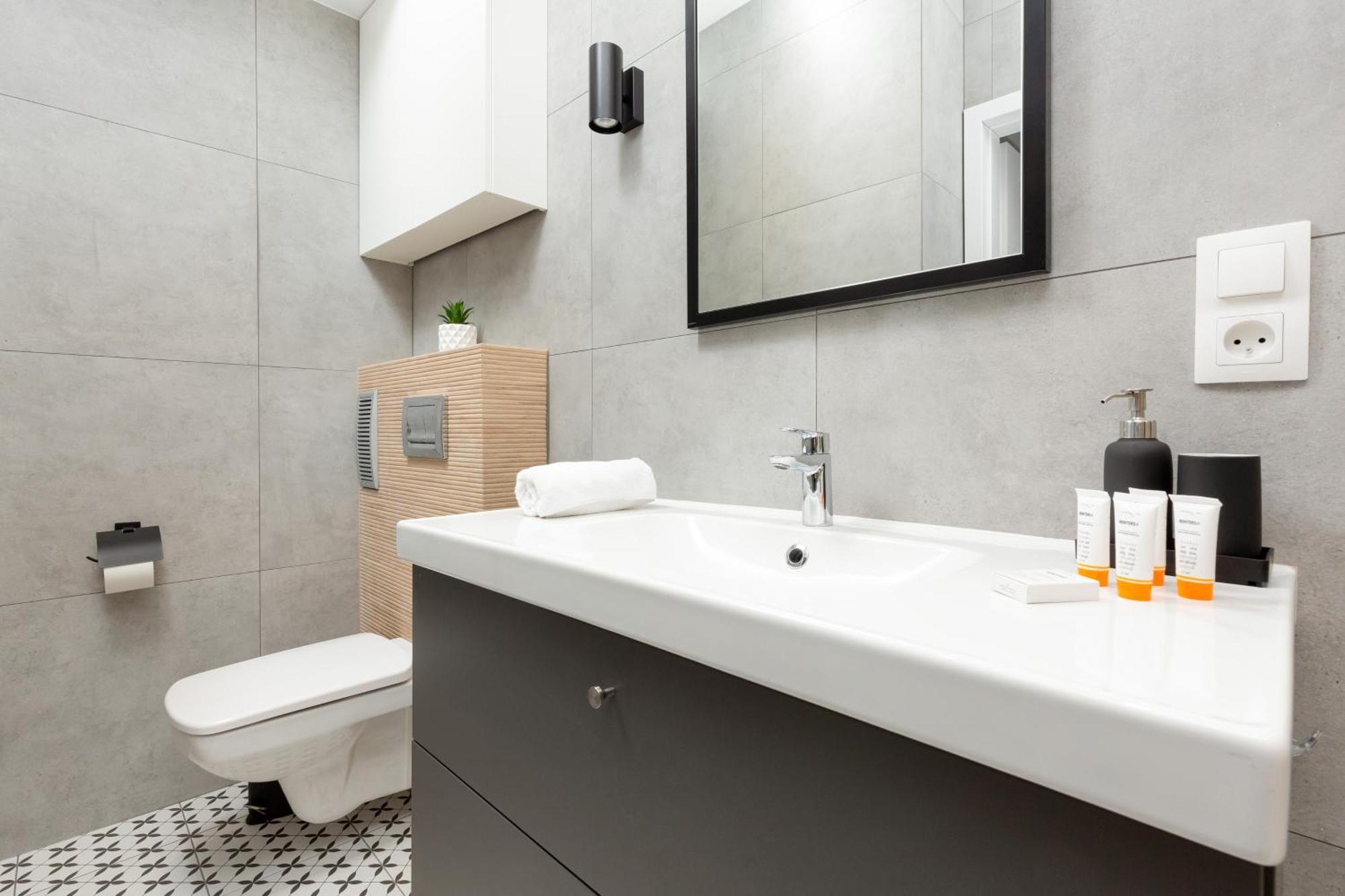 Central Apartment Emilii Plater By Noclegi Renters Varsavia Esterno foto